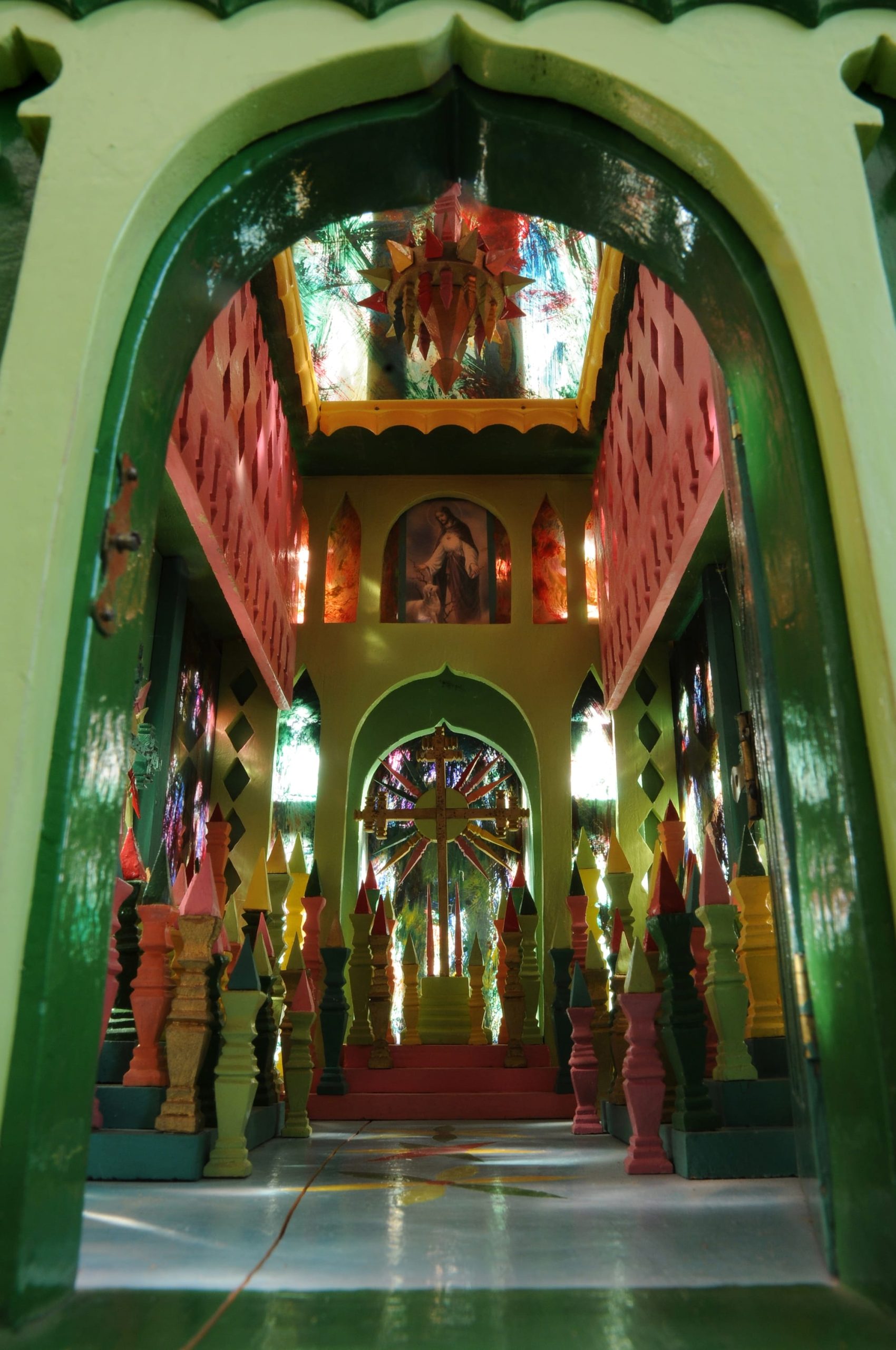 the inside of an elaborate wood carved cathedral