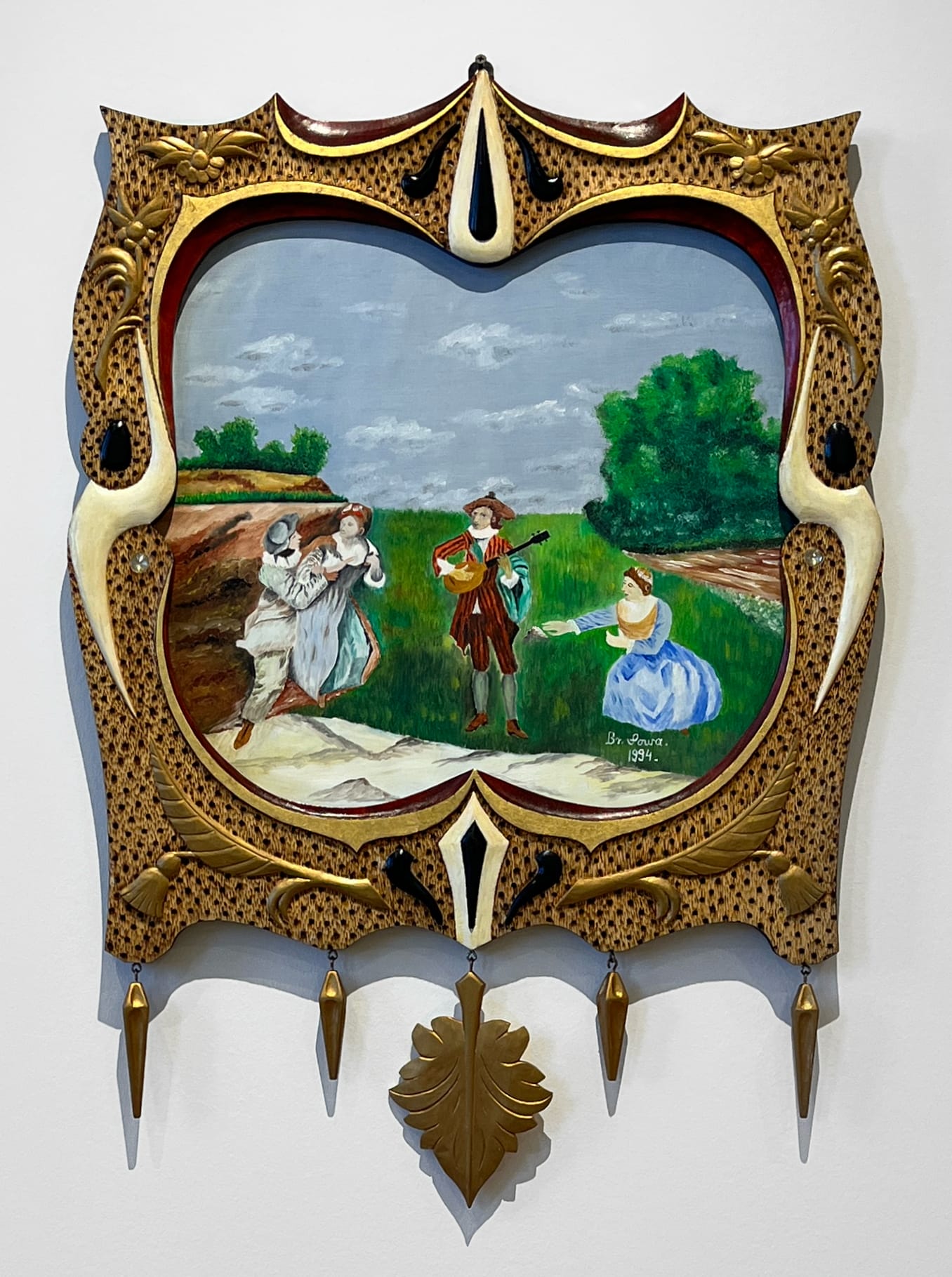 a pastoral painting of four victorian era people in a carved wood frame